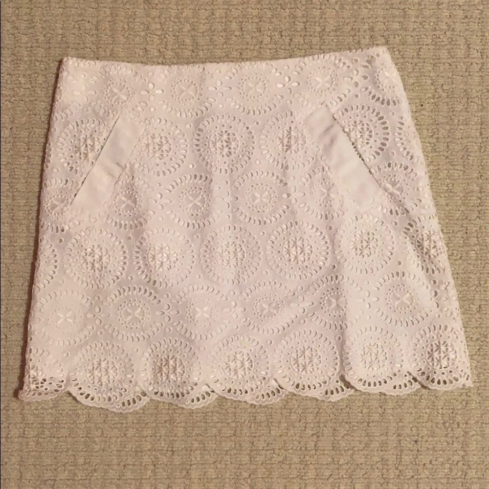 White eyelet mini skirt